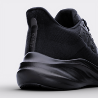 Zapatillas running Zero Haus – vista posterior, contrafuerte estabilizador y logo Monk